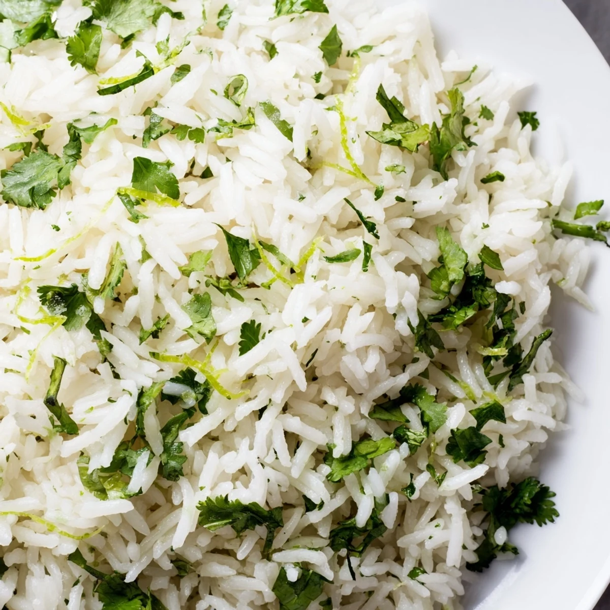 Close-up of freshly made Cilantro Lime Rice, cooked with zesty lime and fragrant cilantro.