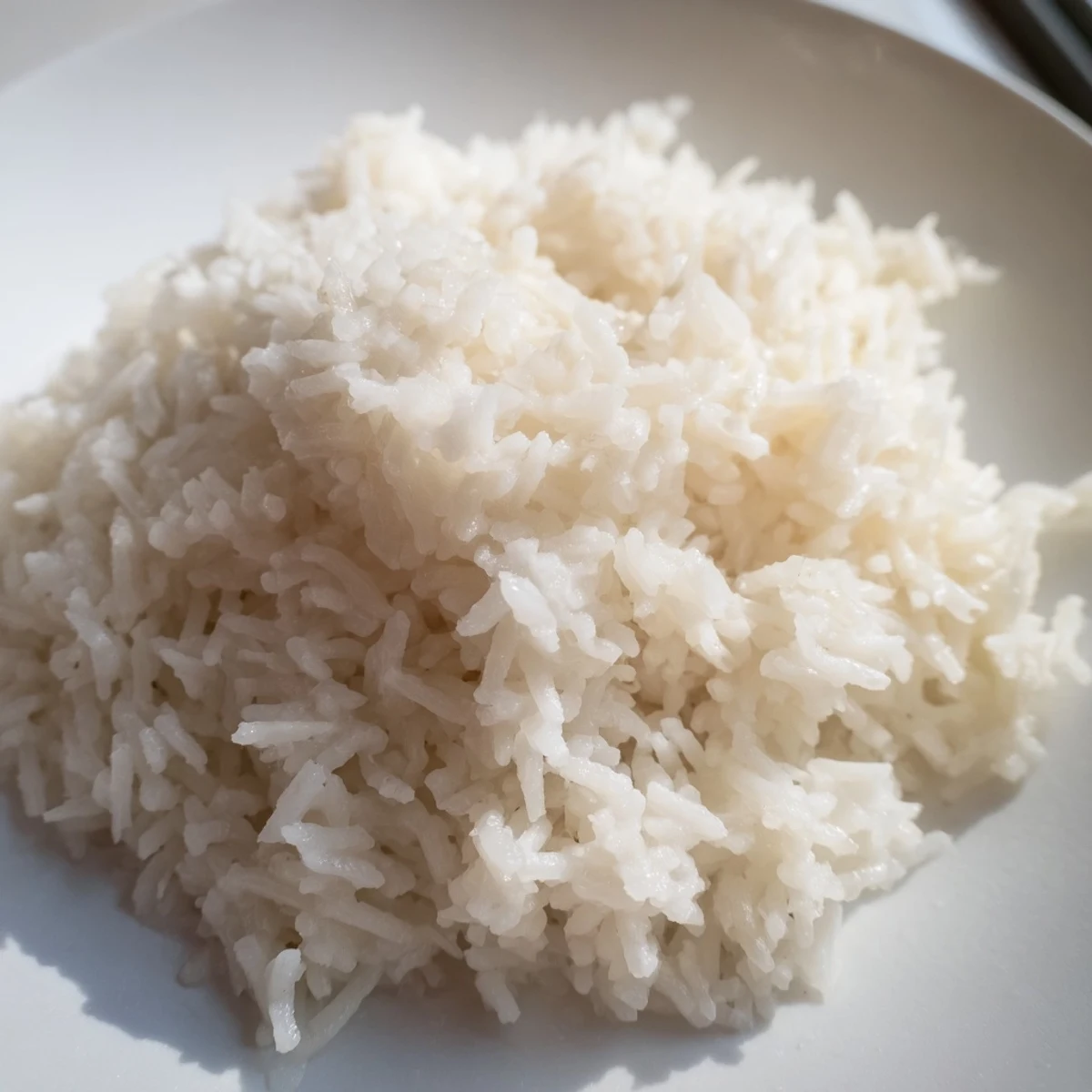 Fluffy Coconut Jasmine Rice, a creamy side dish with a hint of sweetness, ready to serve.