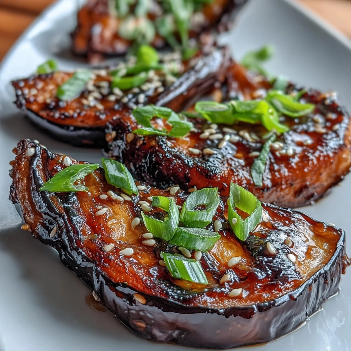 Miso glazed eggplant, roasted until tender, brushed with sweet-savory glaze and broiled.