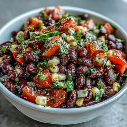 Fresh 3-ingredient cowboy caviar dip with black beans, corn, and zesty pico de gallo, perfect for parties or snacking.