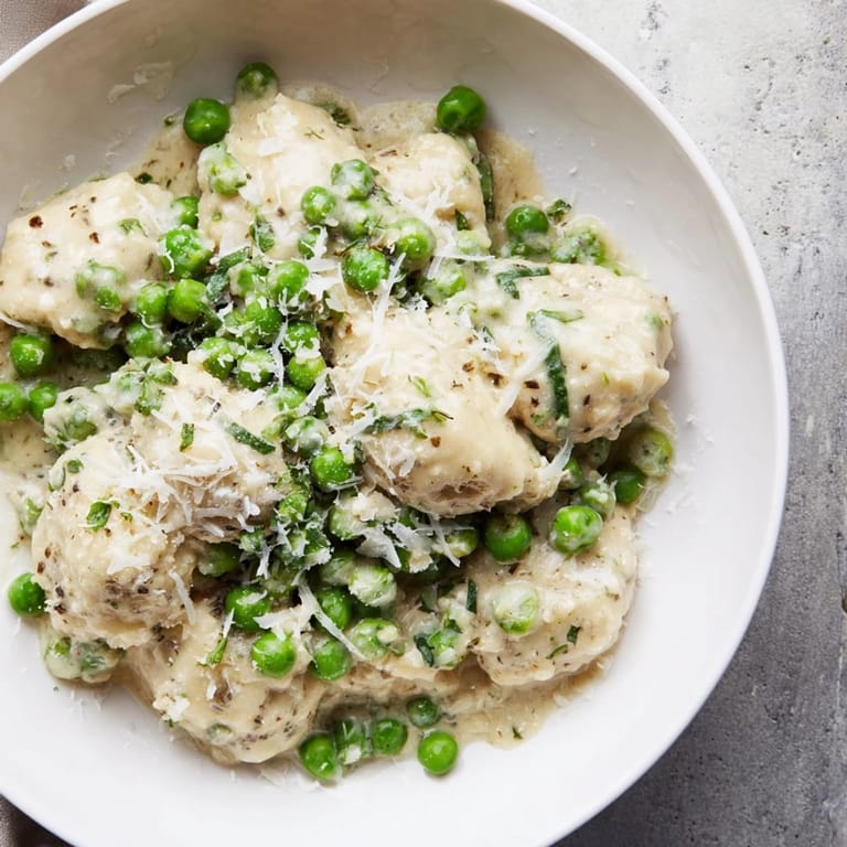 Golden, creamy Creamy Parmesan Orzo with Green Peas, enticingly served, bursting with flavor for dinner.