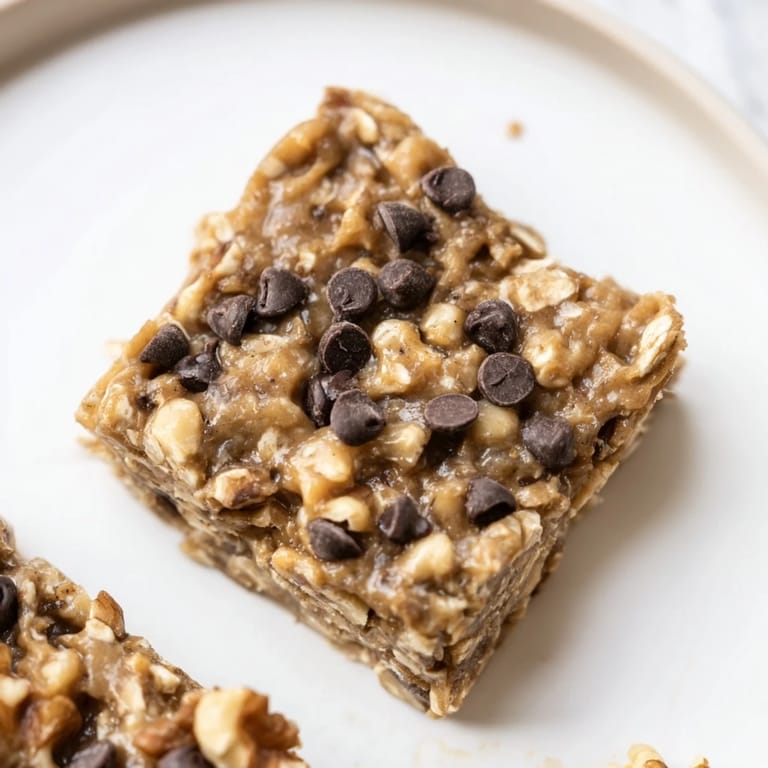 These Peanut Butter Banana Oat Bars served cold, featuring a naturally sweet treat, perfect for a fast breakfast.