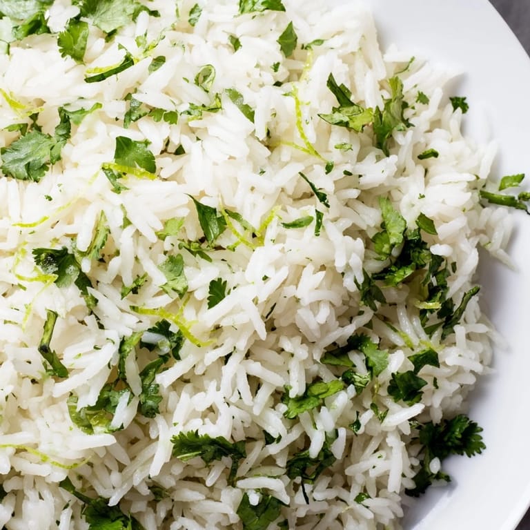 Close-up of freshly made Cilantro Lime Rice, cooked with zesty lime and fragrant cilantro.
